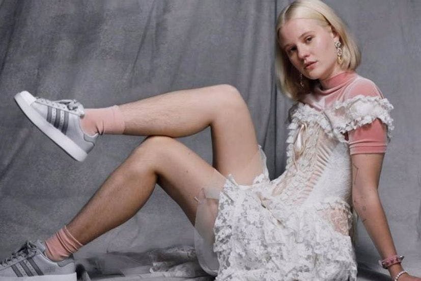 Adidas model gets rape threats over hairy leg photographs