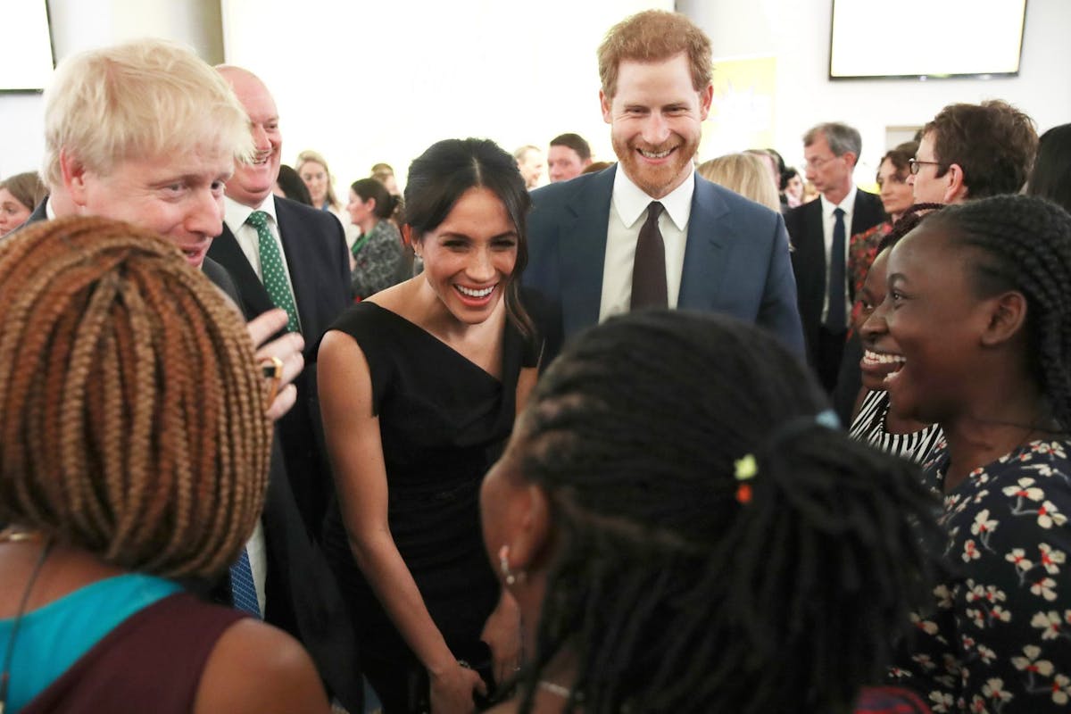 LONDON, ENGLAND - APRIL 19: Foreign Secretary Boris Johnson, Meghan Markle and Prince Harry speak with guests as they attend the Women's Empowerment reception hosted by the Foreign Secretary during the Commonwealth Heads of Government Meeting at the Royal Aeronautical Society on April 19, 2018 in London, England. (Photo by Chris Jackson - WPA Pool/Getty Images)