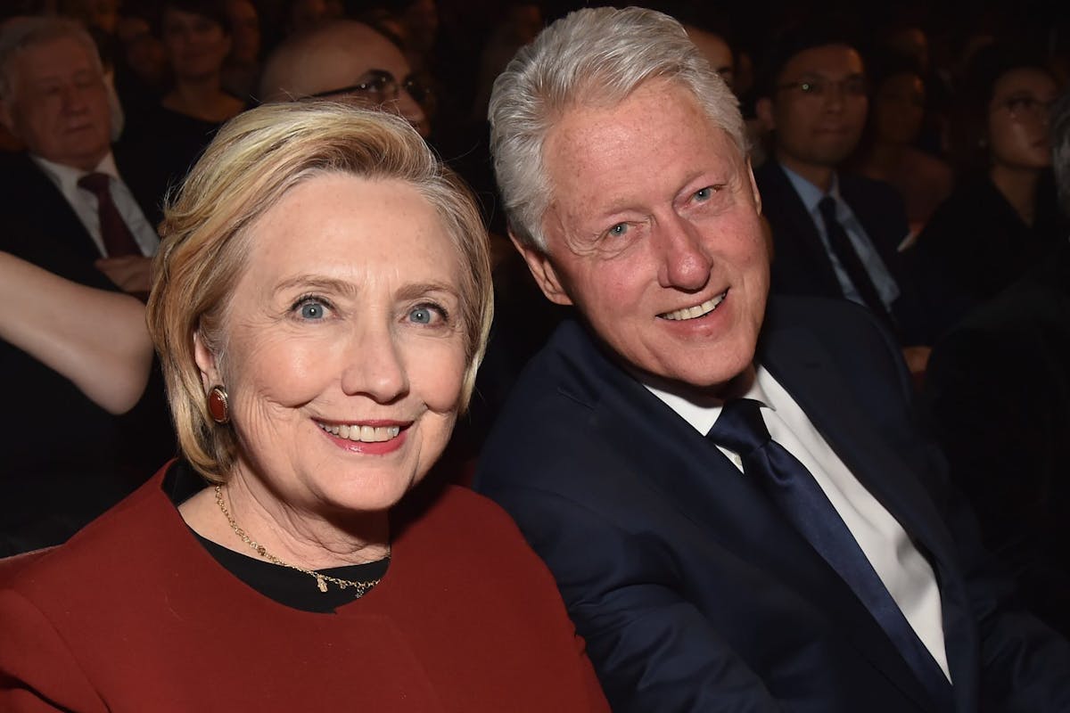 NEW YORK, NY - JANUARY 26: Former U.S. Secretary of State Hillary Clinton (L) and former U.S. President Bill Clinton attend MusiCares Person of the Year honoring Fleetwood Mac at Radio City Music Hall on January 26, 2018 in New York City. (Photo by Kevin Mazur/Getty Images for NARAS)