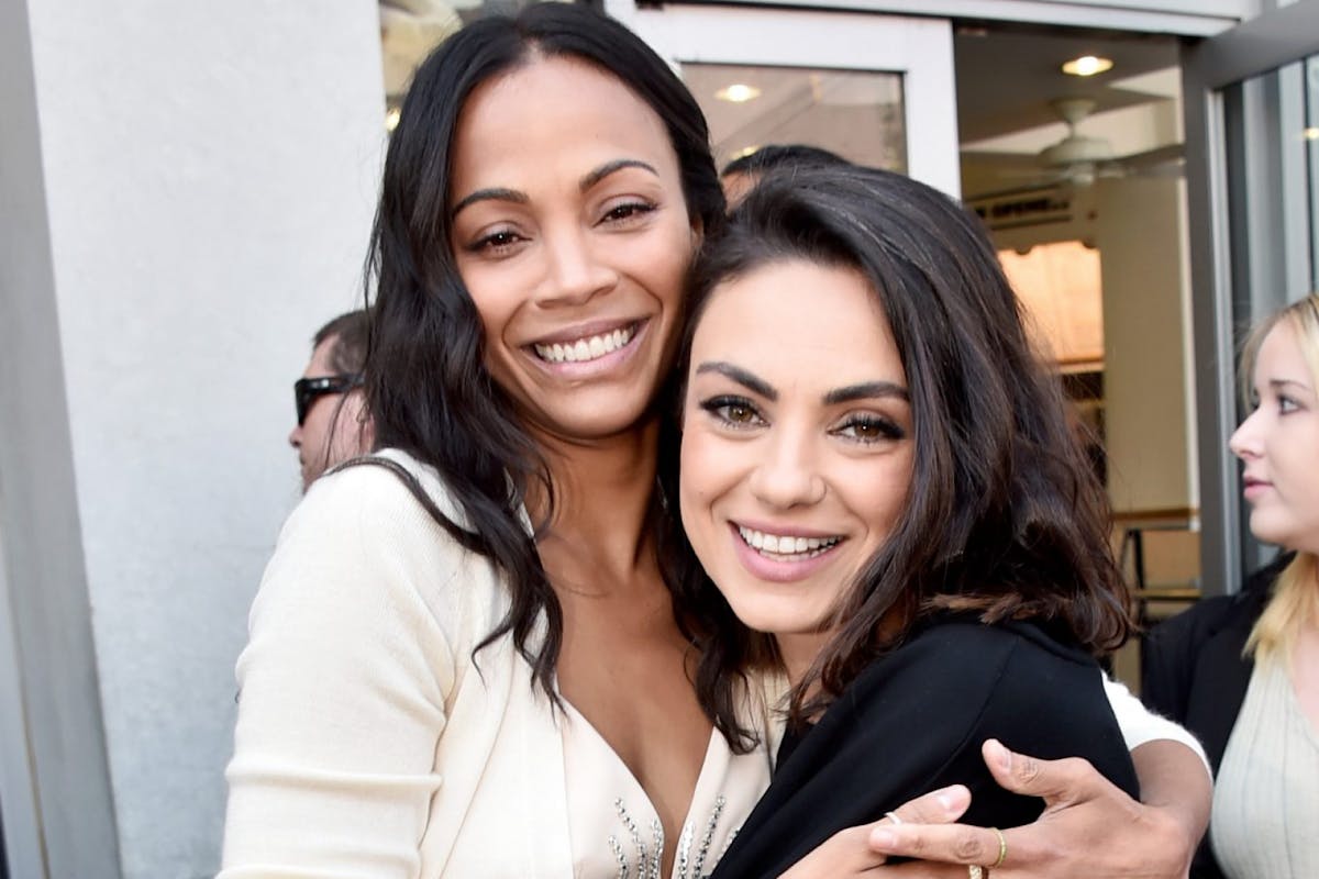 HOLLYWOOD, CA - MAY 03: Honoree Zoe Saldana (L) and actor Mila Kunis at the Zoe Saldana Walk Of Fame Star Ceremony on May 3, 2018 in Hollywood, California. (Photo by Alberto E. Rodriguez/Getty Images for Disney)