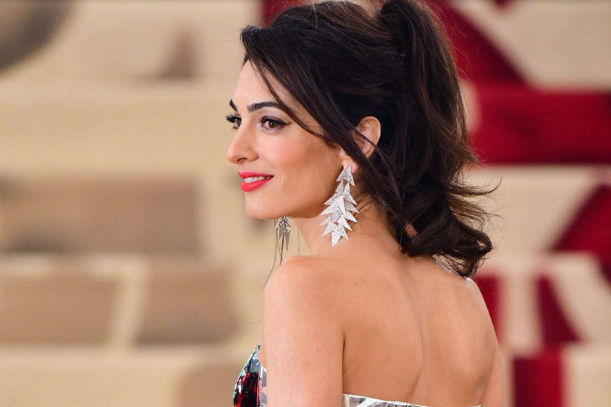 NEW YORK, NY - MAY 07: Amal Clooney attends the Heavenly Bodies: Fashion & The Catholic Imagination Costume Institute Gala at The Metropolitan Museum of Art on May 7, 2018 in New York City. (Photo by James Devaney/GC Images)
