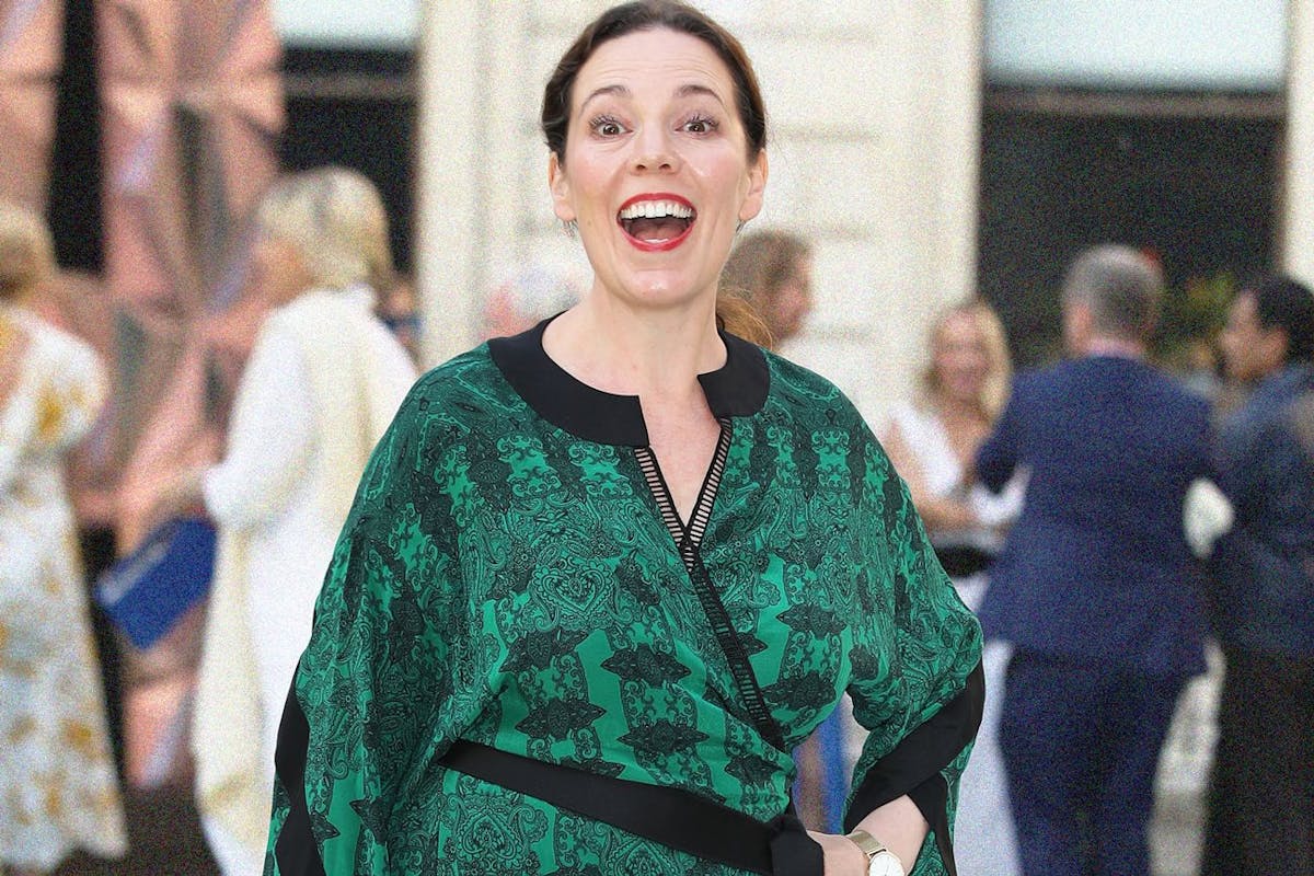 Olivia Colman smiling on the red carpet