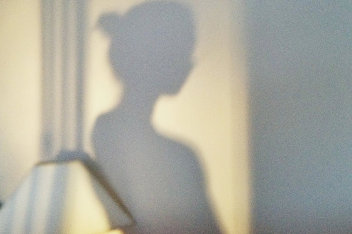 Woman in shadow