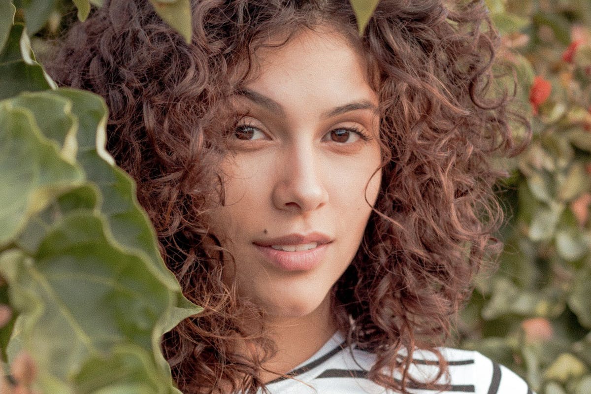 girl with fine curly hair