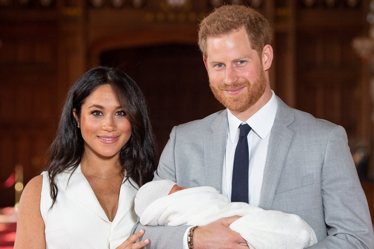 Prince Harry, Duke of Sussex and Meghan, Duchess of Sussex, pose with their newborn son Archie Harrison Mountbatten-Windsor.