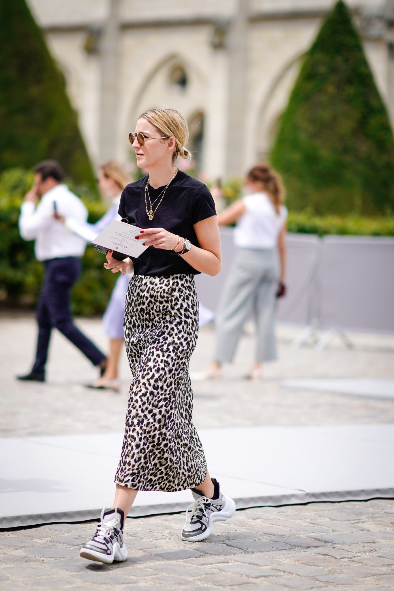 midi skirt and trainers