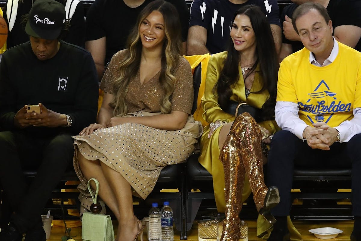 OAKLAND, CALIFORNIA - JUNE 05: (L-R) Jay-Z, Beyonce, Nicole Curran and Joseph S. Lacob attend Game Three of the 2019 NBA Finals between the Golden State Warriors and the Toronto Raptors at ORACLE Arena on June 05, 2019 in Oakland, California. NOTE TO USER: User expressly acknowledges and agrees that, by downloading and or using this photograph, User is consenting to the terms and conditions of the Getty Images License Agreement. (Photo by Ezra Shaw/Getty Images)