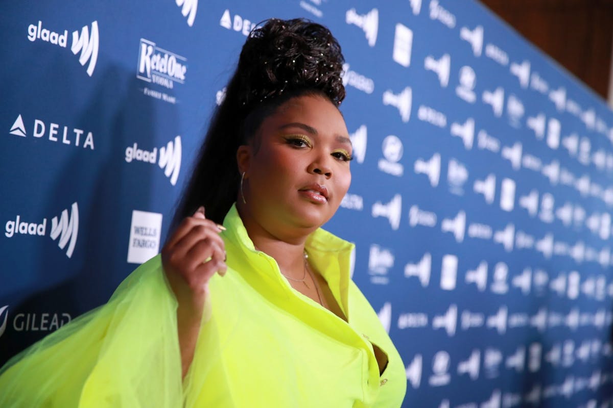Lizzo on the GLAAD awards red carpet in green dress