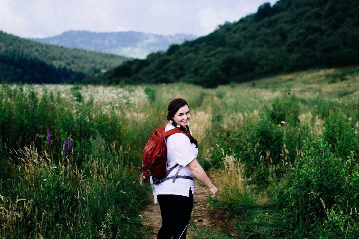 A woman walking in the countryside