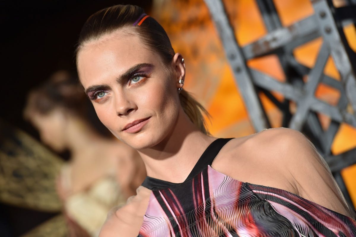 Cara Delevingne praises Taylor Swift for re-recording old songs