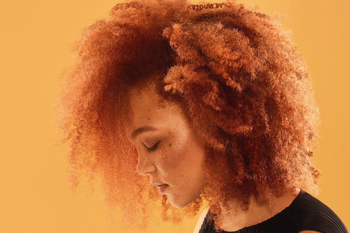 girl with red curly hair