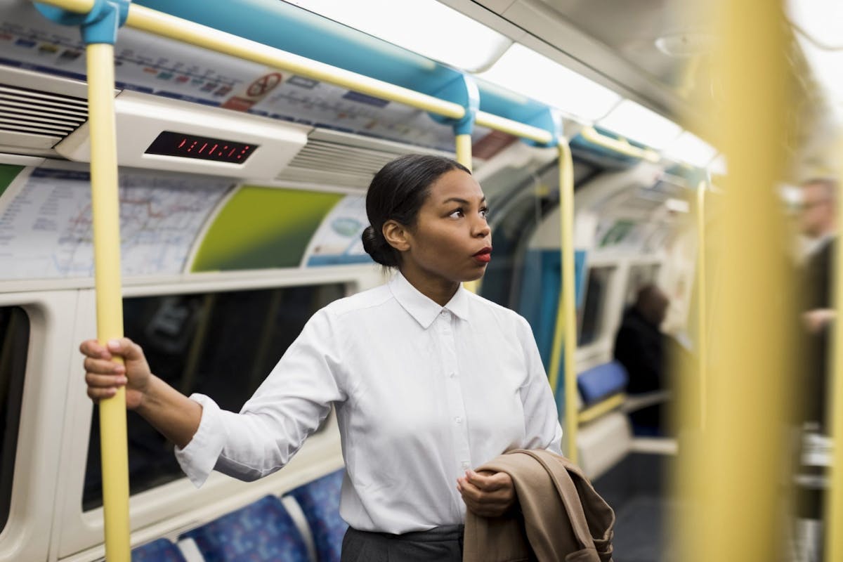 A woman commuting on the London underground/tube