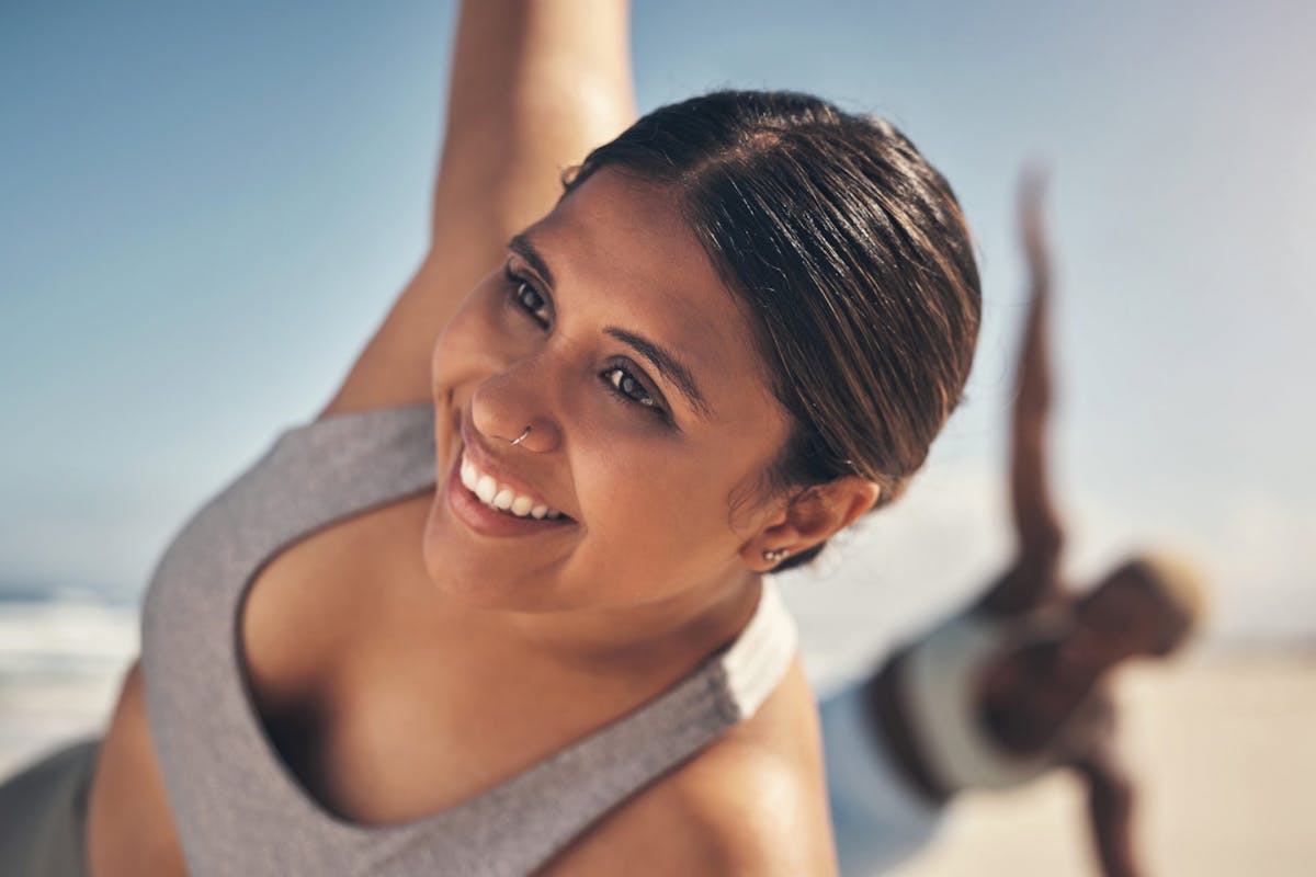 Close up of a woman doing a side plank
