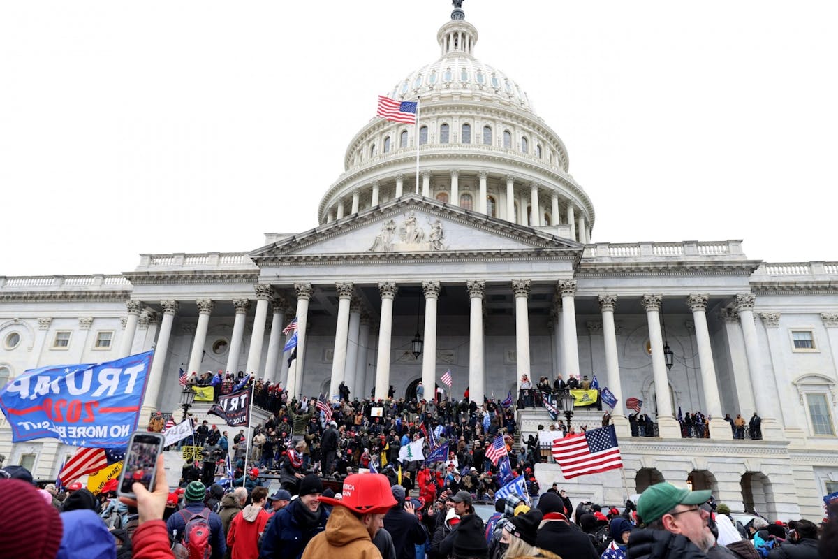 The US Capitol building being stormed by Trump supporters yesterday 6 January