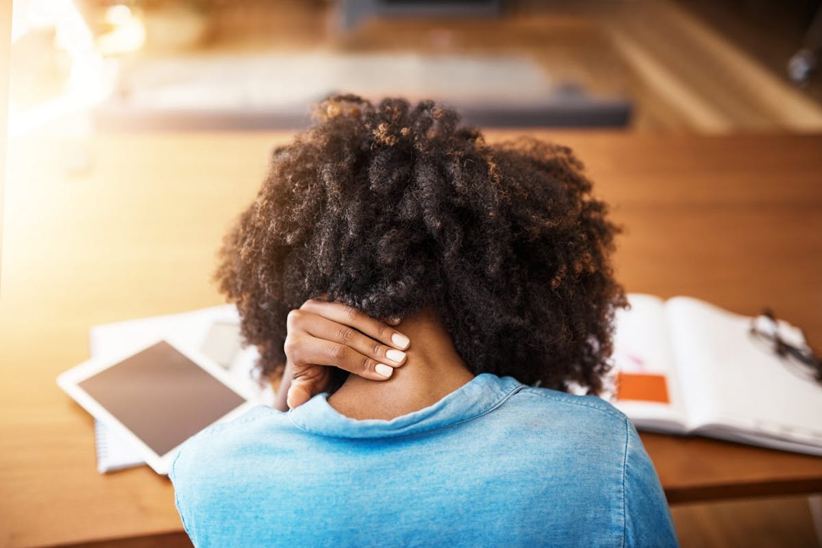 A woman stressed while working from home