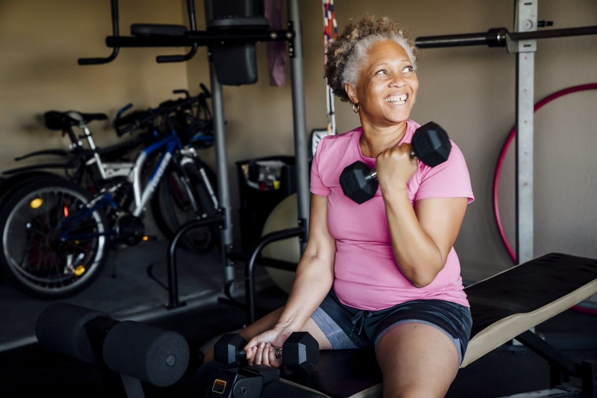 Older woman lifting weights