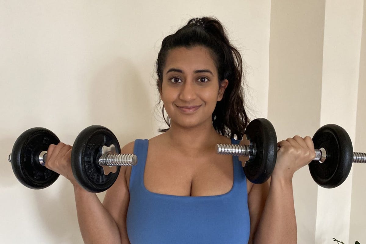 woman holding weights