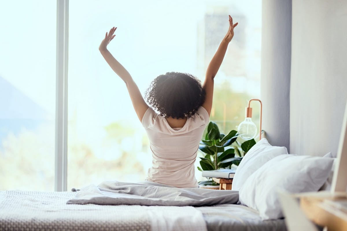 A woman stretching in the morning