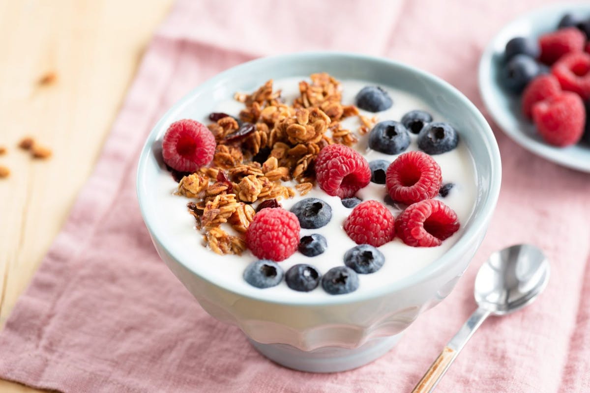 Bowl of yoghurt berries and granola