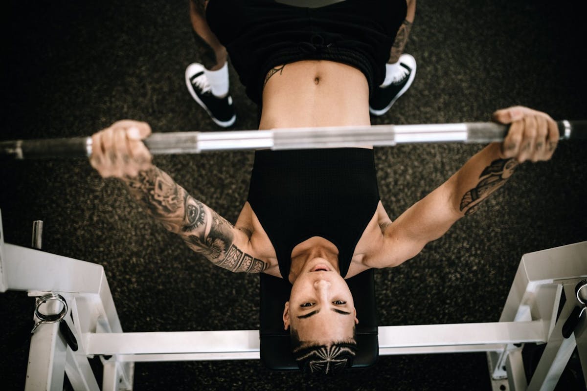 A woman doing bench press exercise