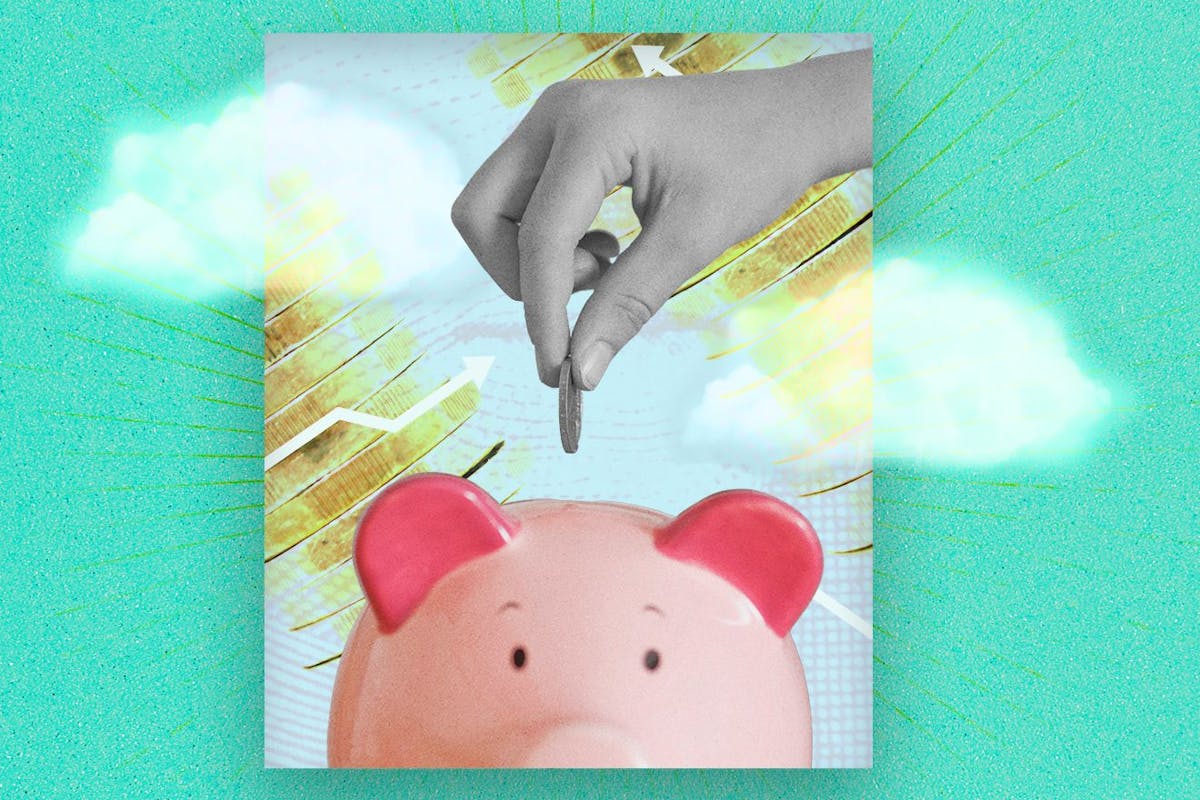hand dropping money in piggybank
