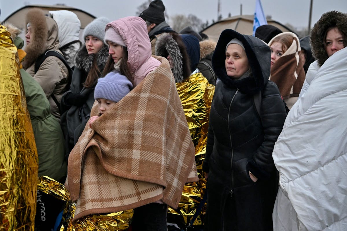 Ukrainian refugees after crossing the Polish border