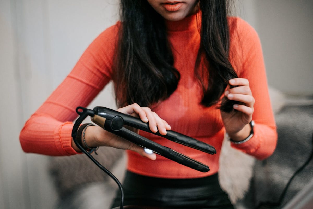 Why You Should Never Straighten Dry Hair