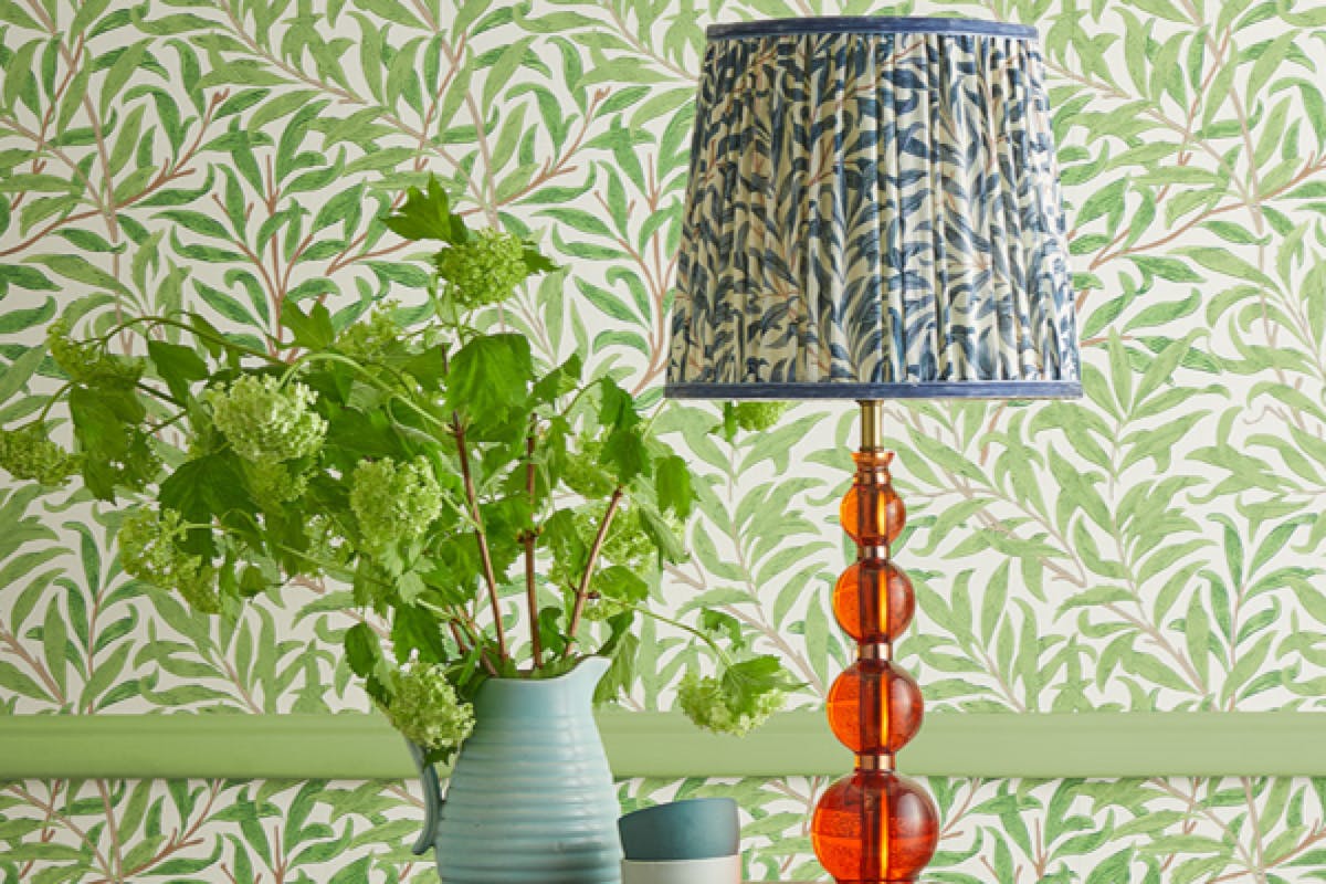 A lamp with a shade from Pooky x Morris & Co collection the